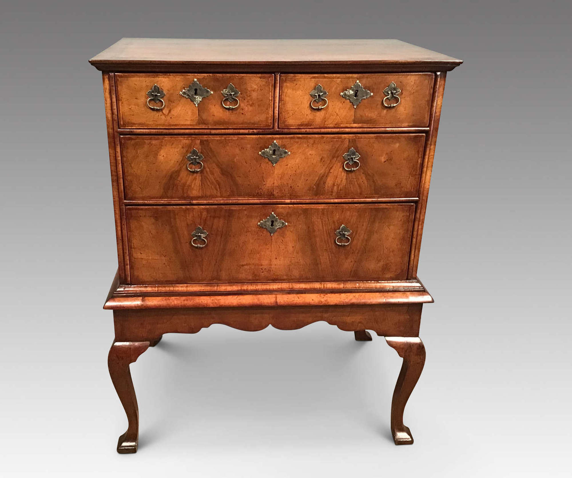 Early 18th century walnut  chest on stand.