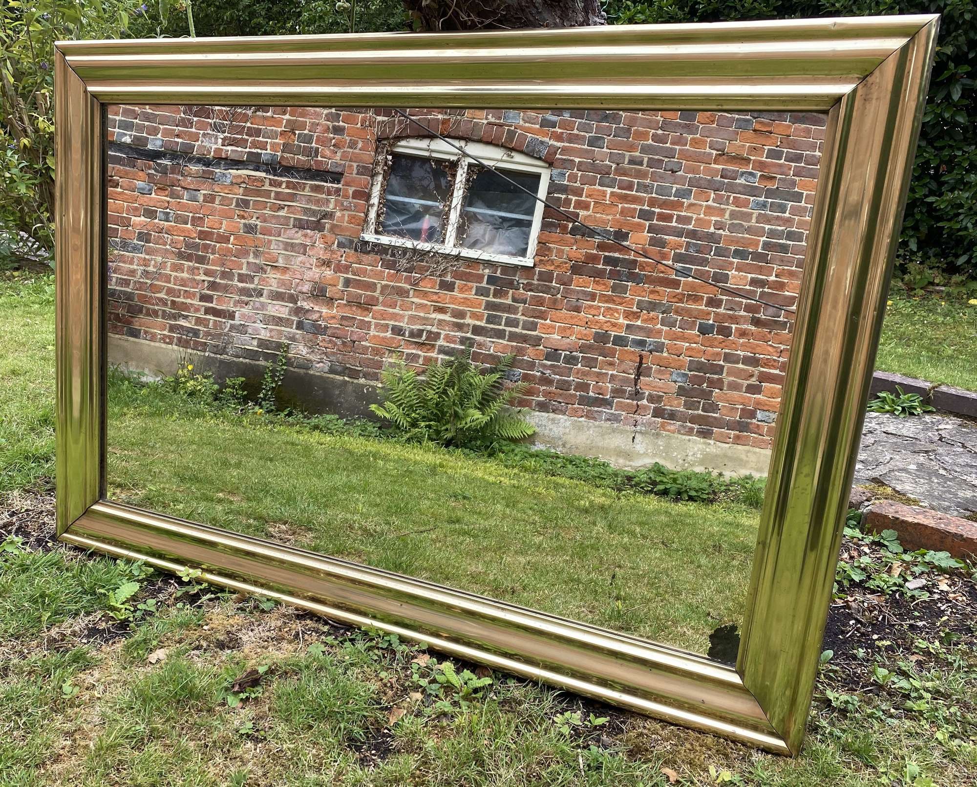 Large brass bistro mirror