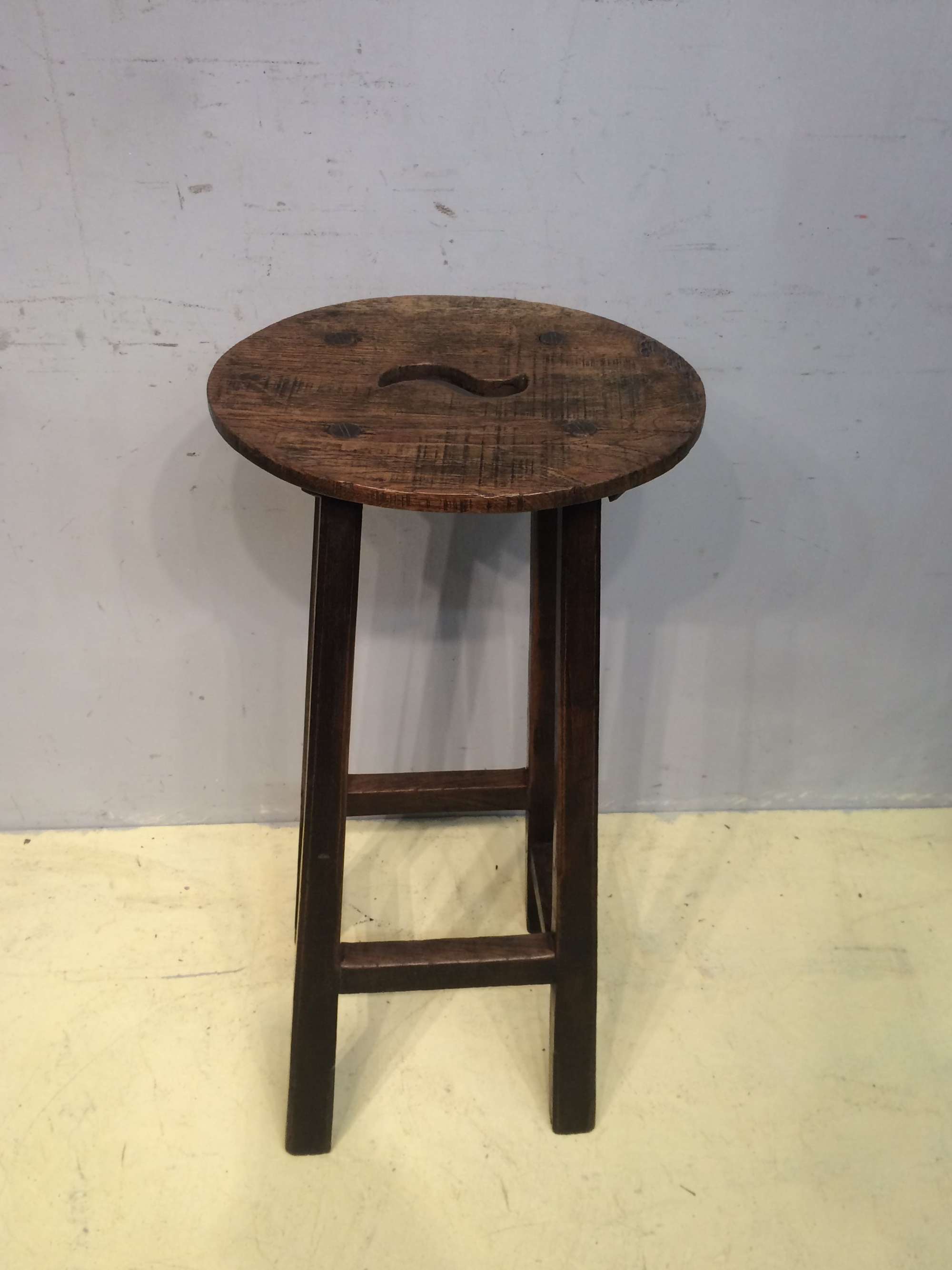 19th century oak tall oval topped stool .