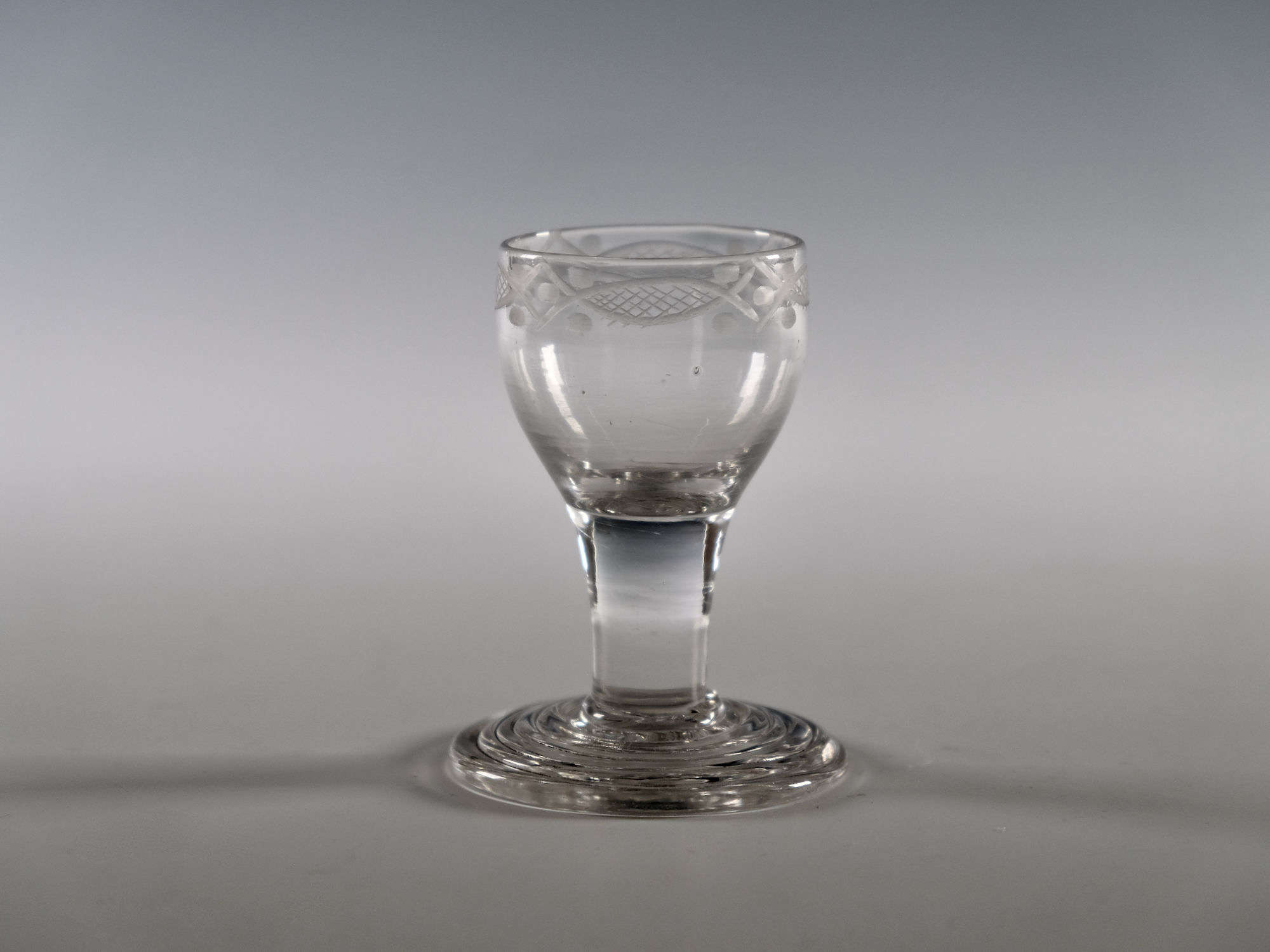 Dram glass with terraced foot English c1760