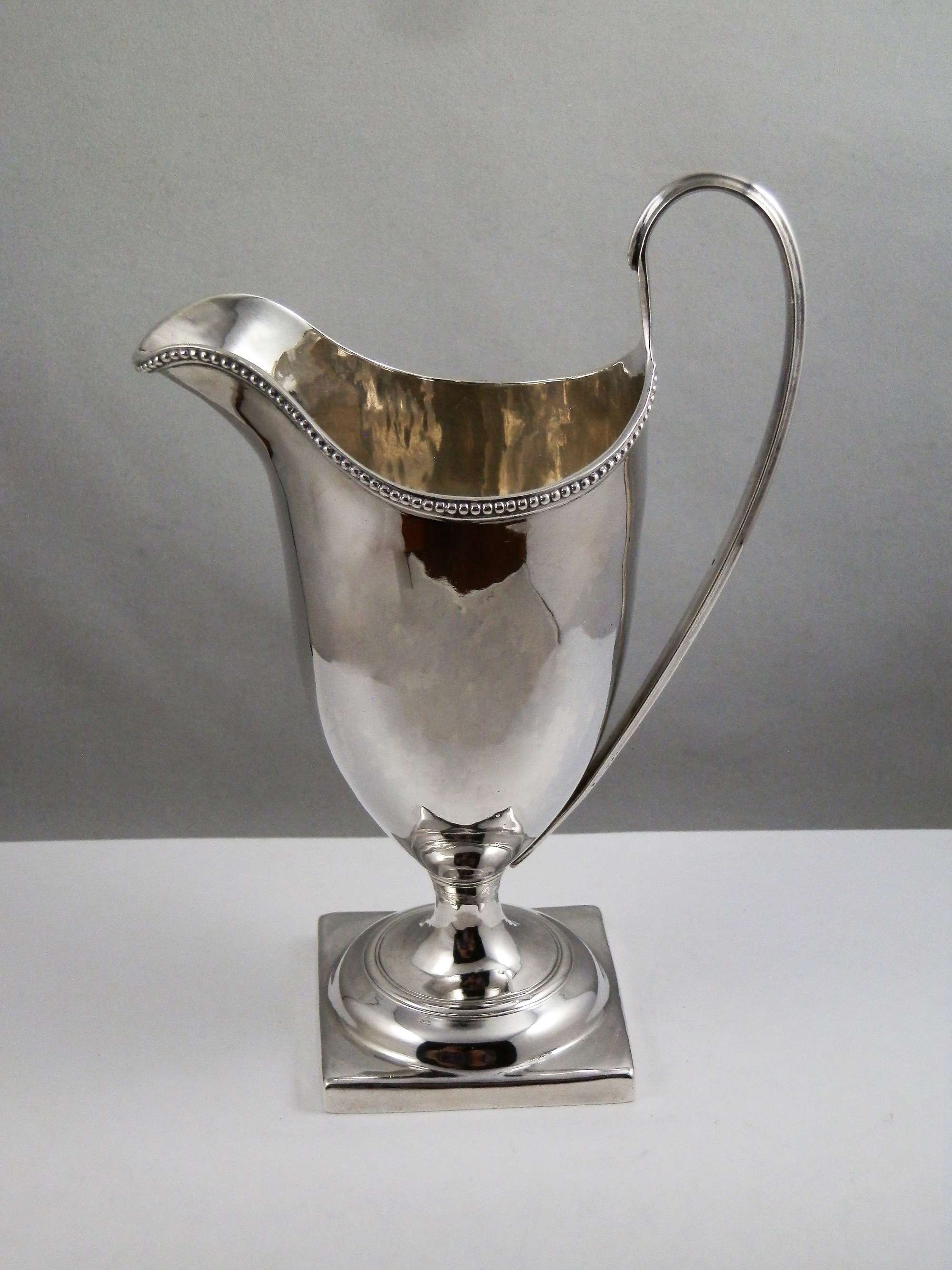George III silver helmet style cream jug, London 1788