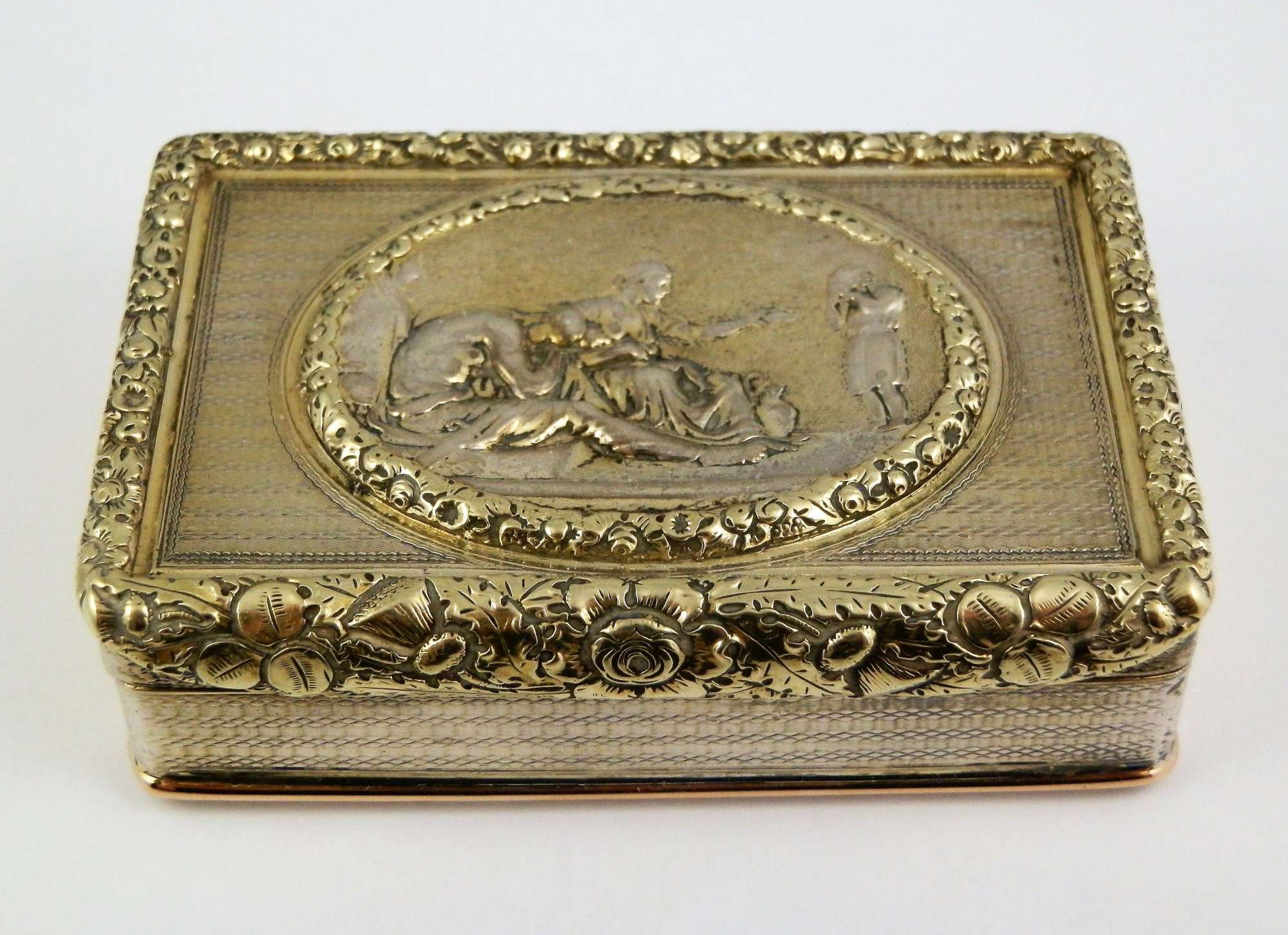 George III silver gilt cast top snuff box, London 1818