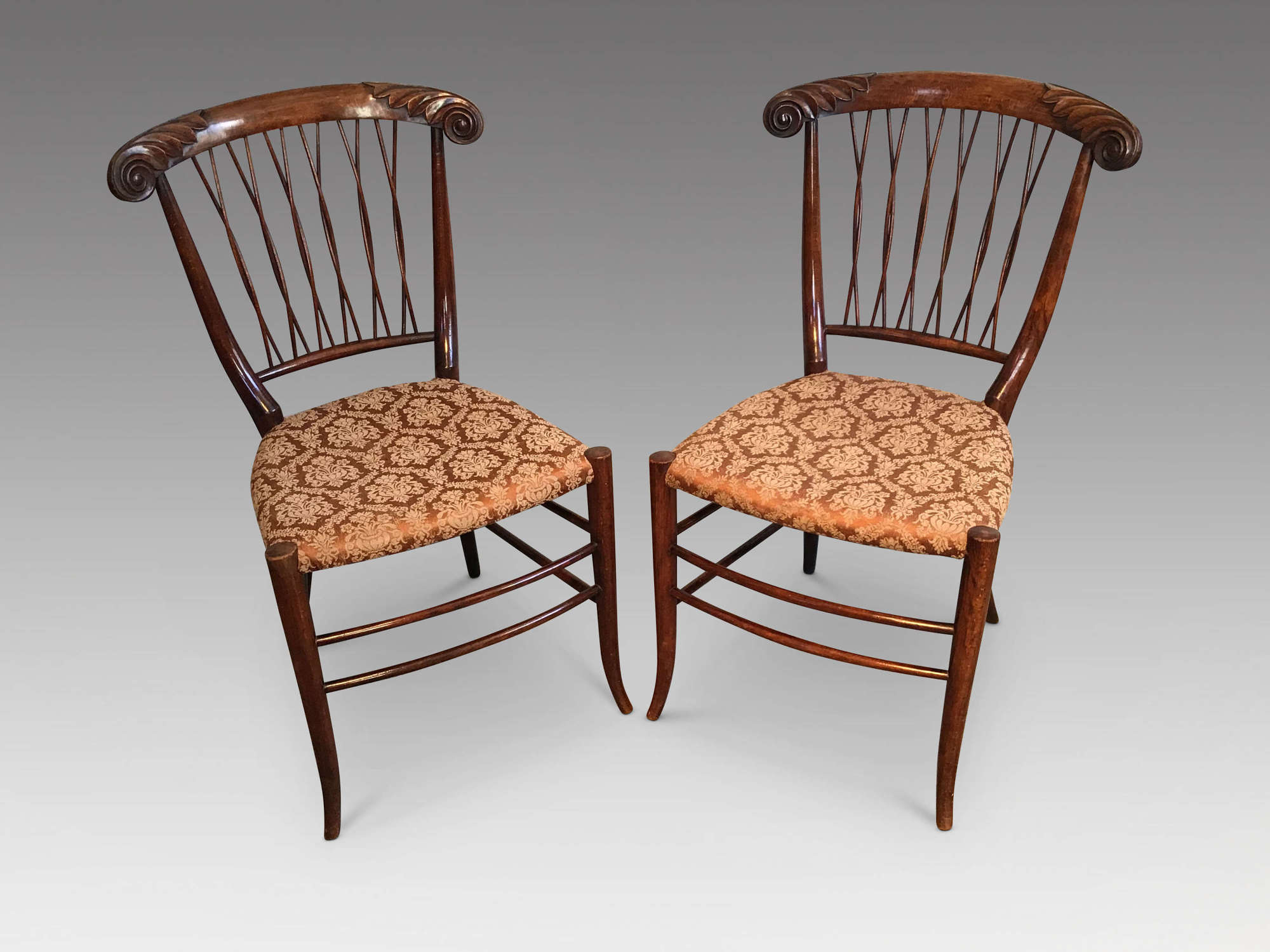 Pair of antique sidechairs.