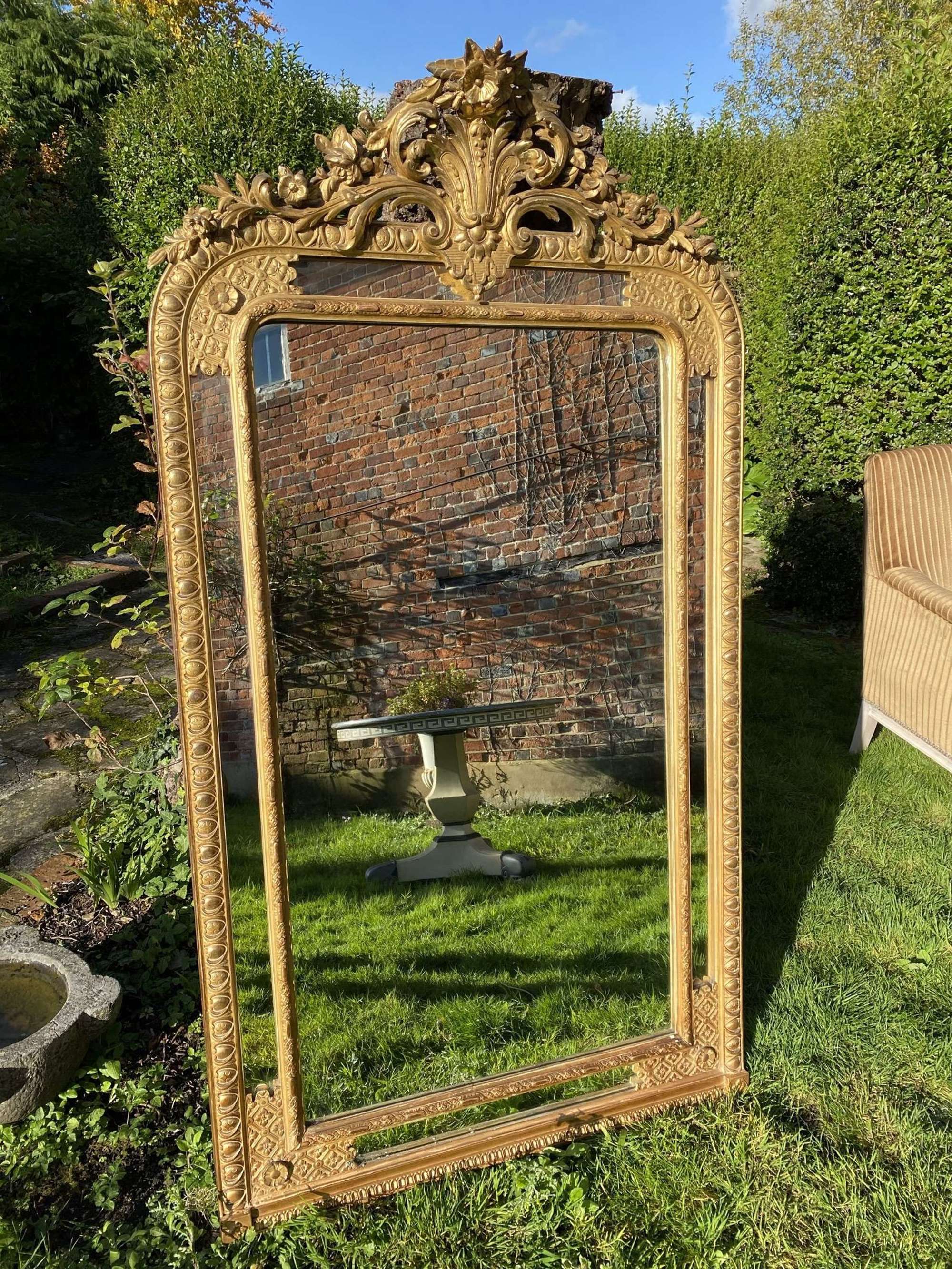Bordered gilt mirror