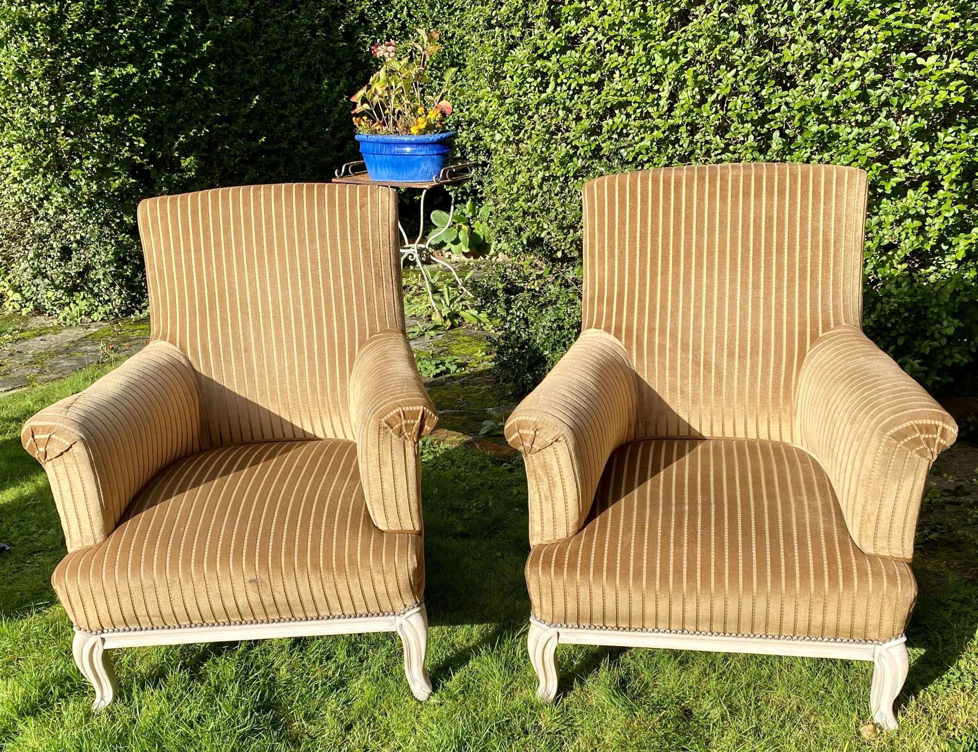 Pair of large upholstered armchairs