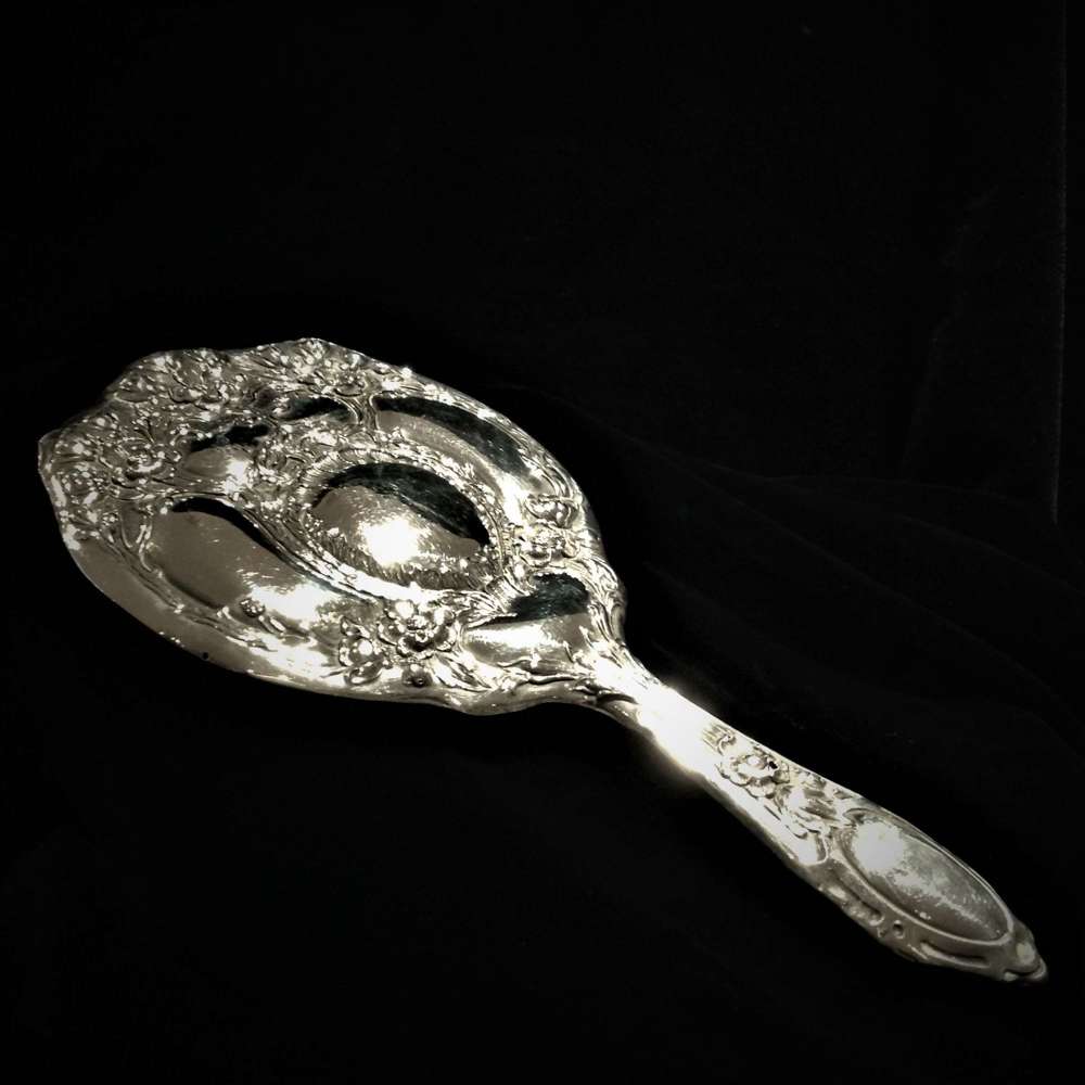 Art Nouveau Sterling Silver repouss&eacute; Hand Mirror