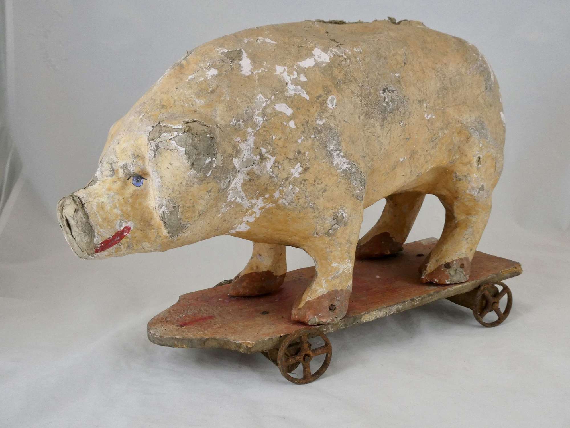 Papier-maché Pig on Wheels, circa 1900