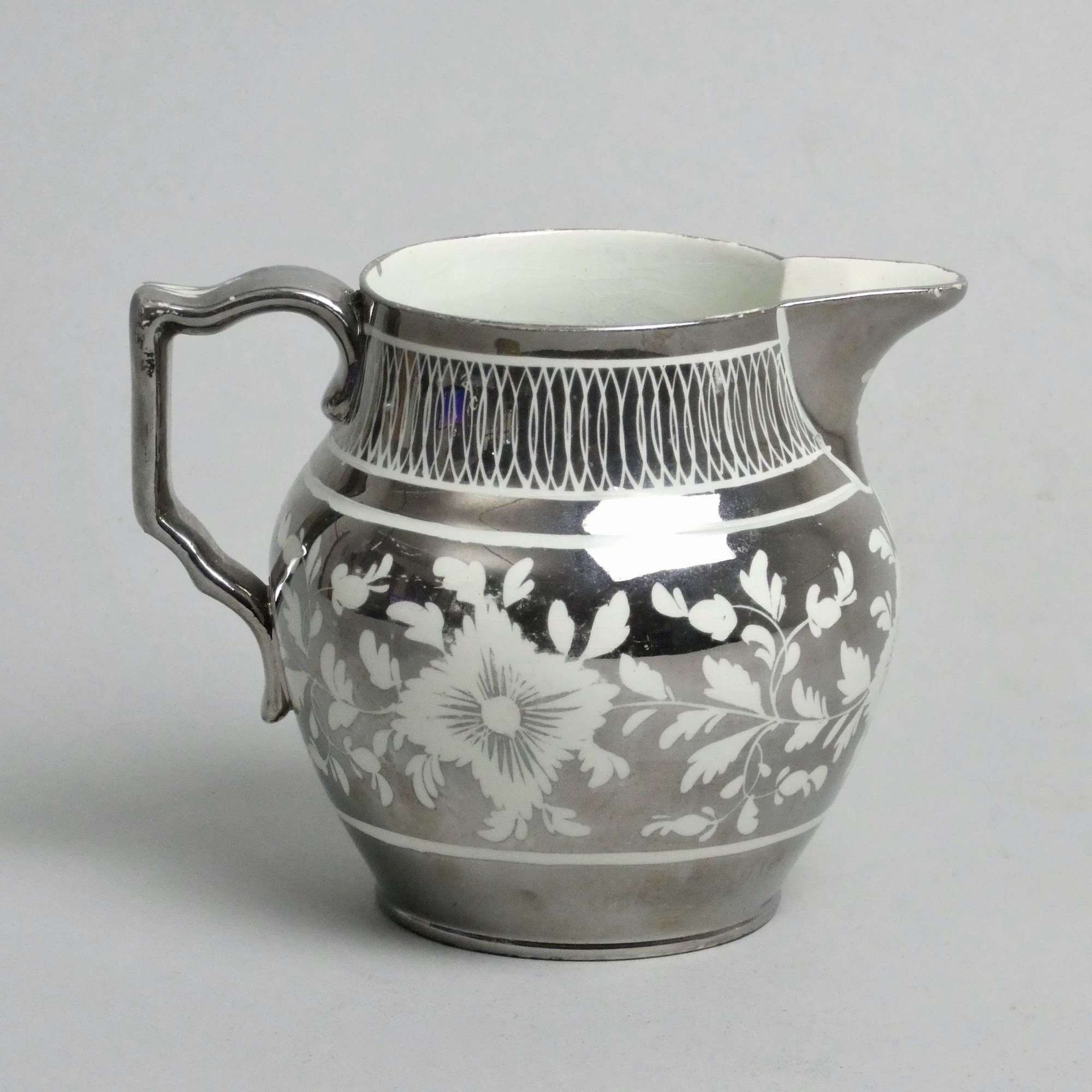 Small silver lustre jug