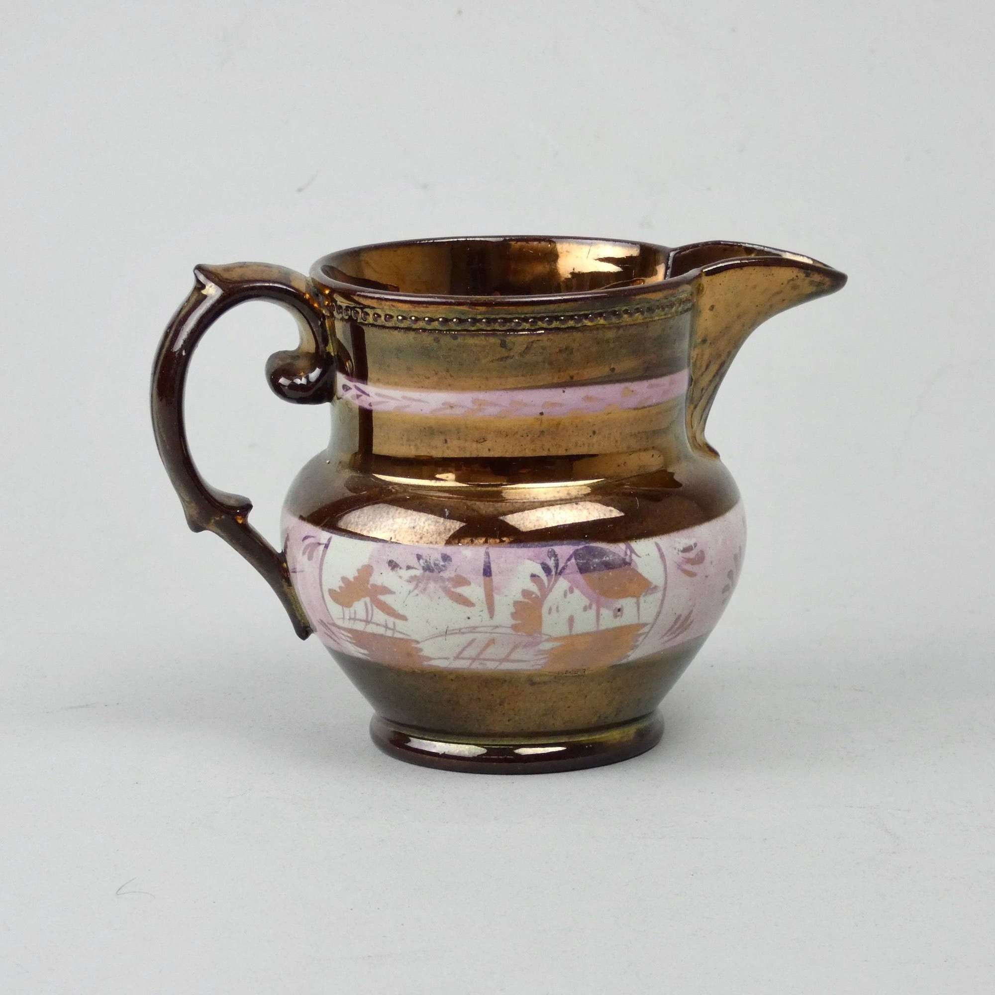 Small copper lustre jug