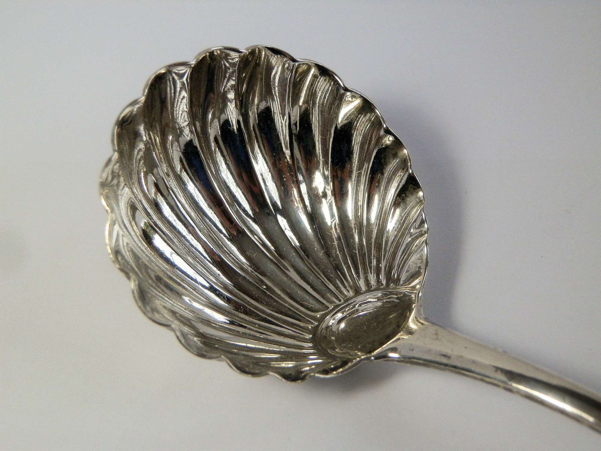 George III silver scallop bowl cream ladle, George Smith 1783