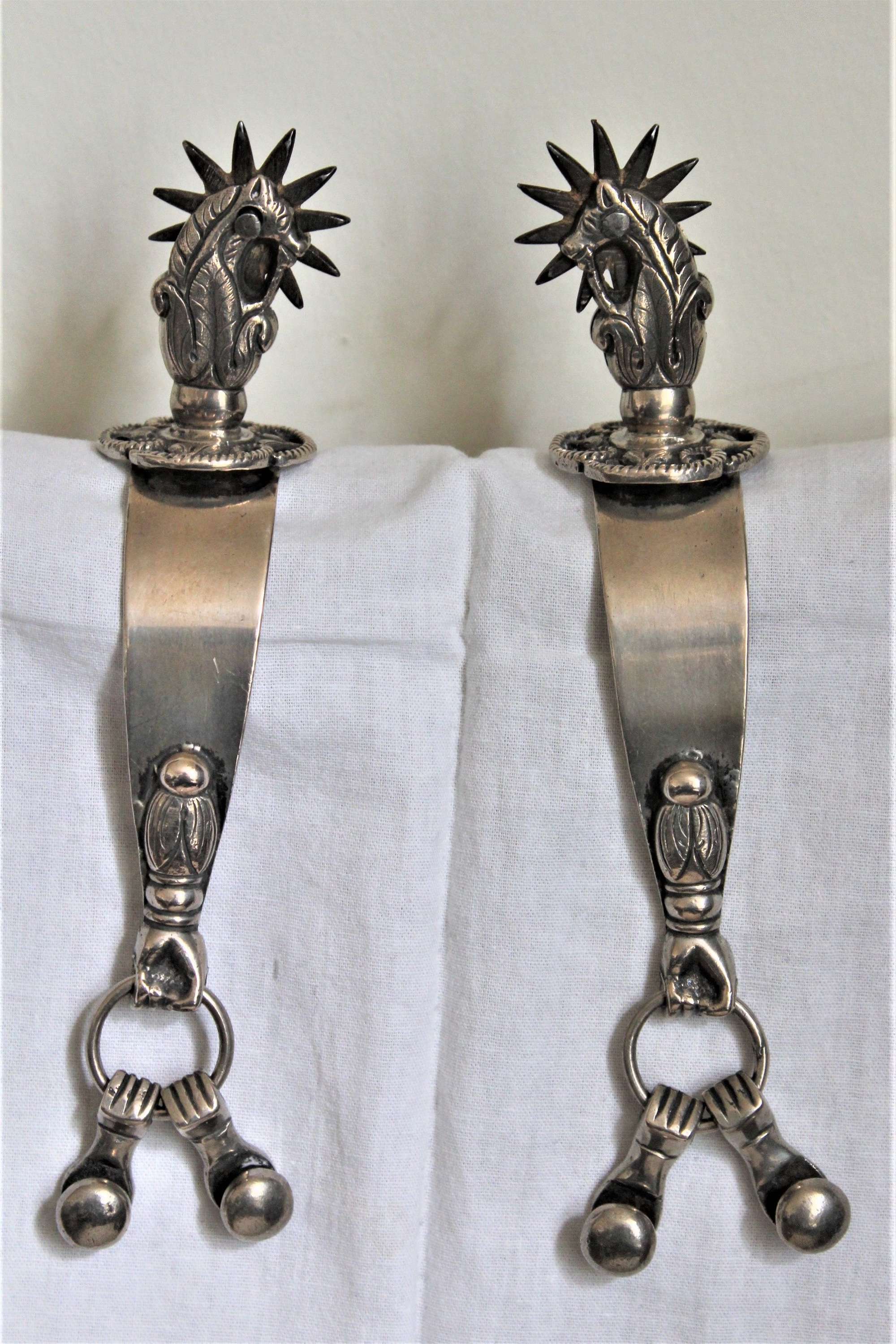 A Pair Of Decorative Hand Made South American Spurs