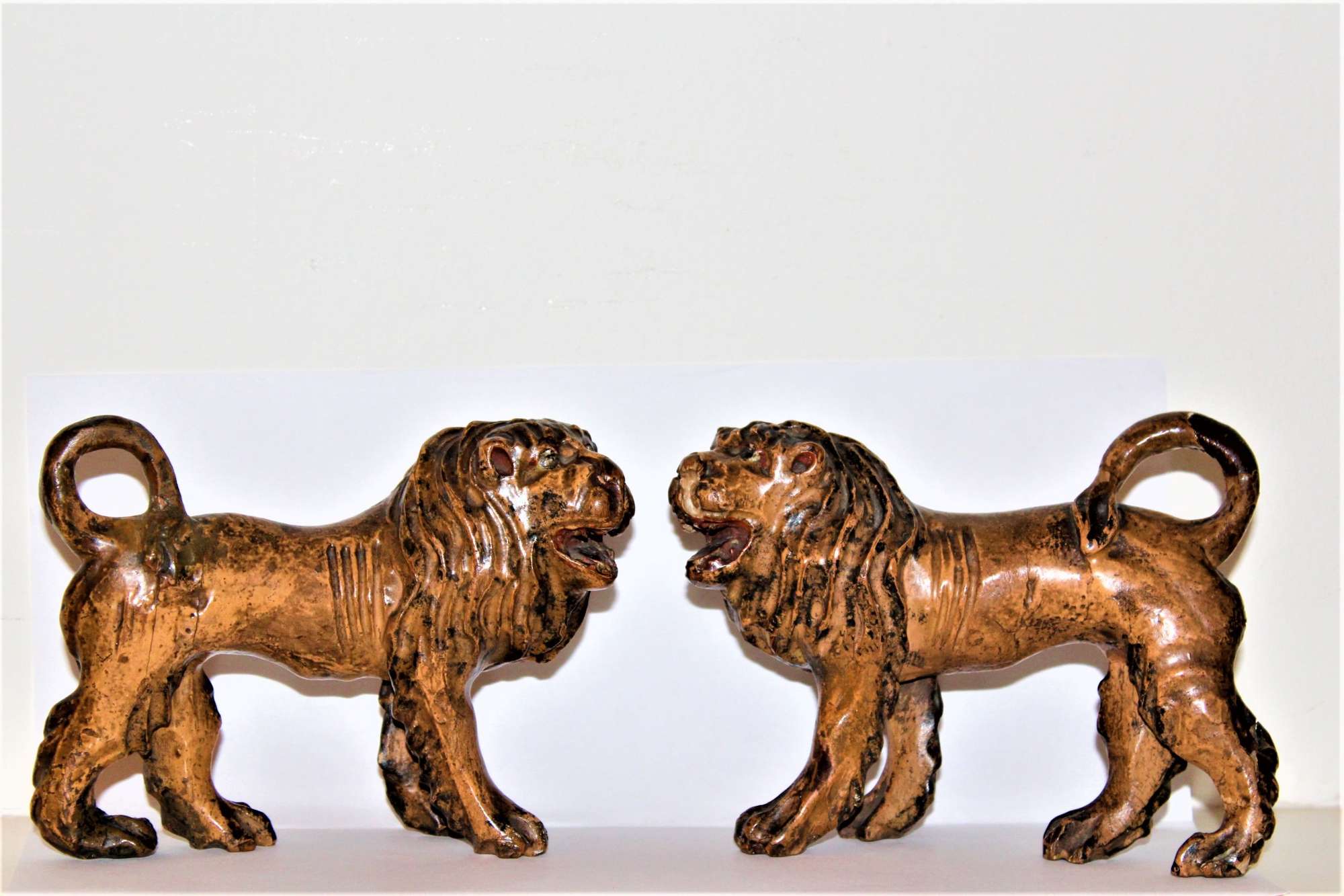 Pair Of Naive And Charming Carved Wood And Polychromed Lions