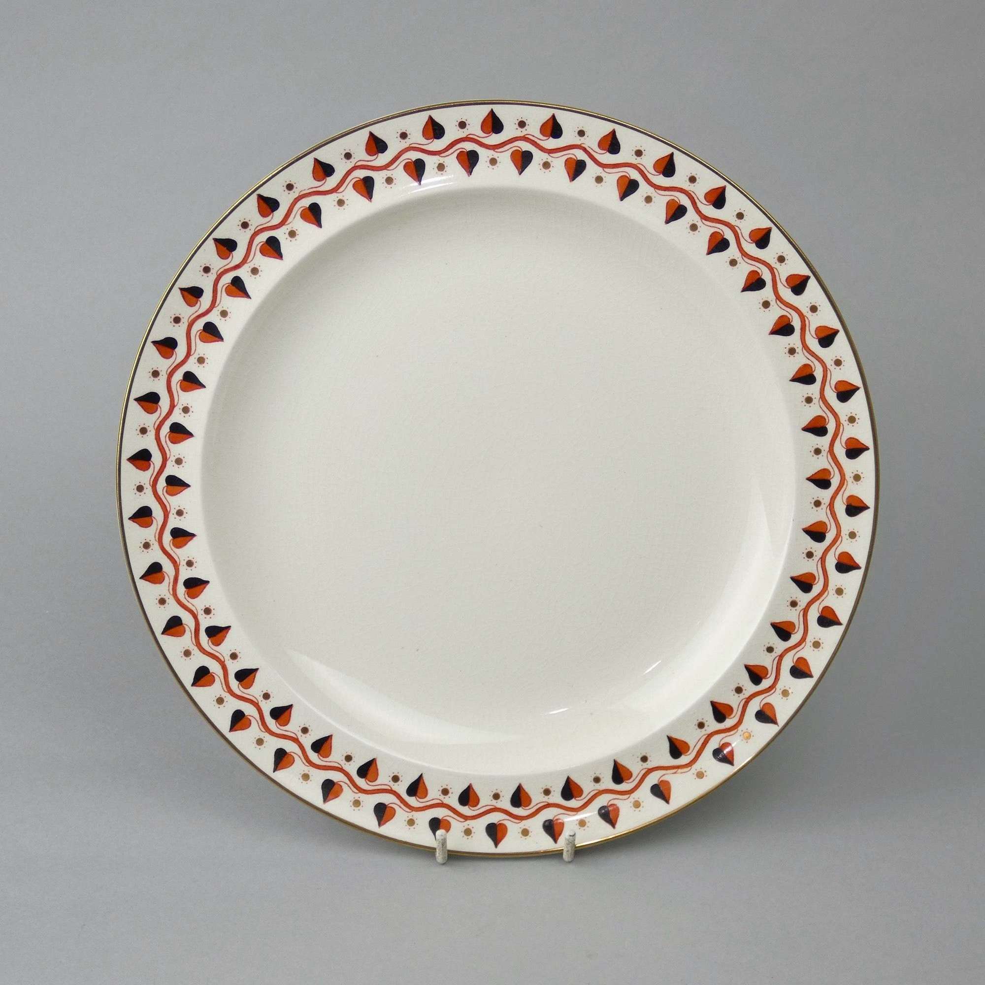Wedgwood plate with painted and gilt border