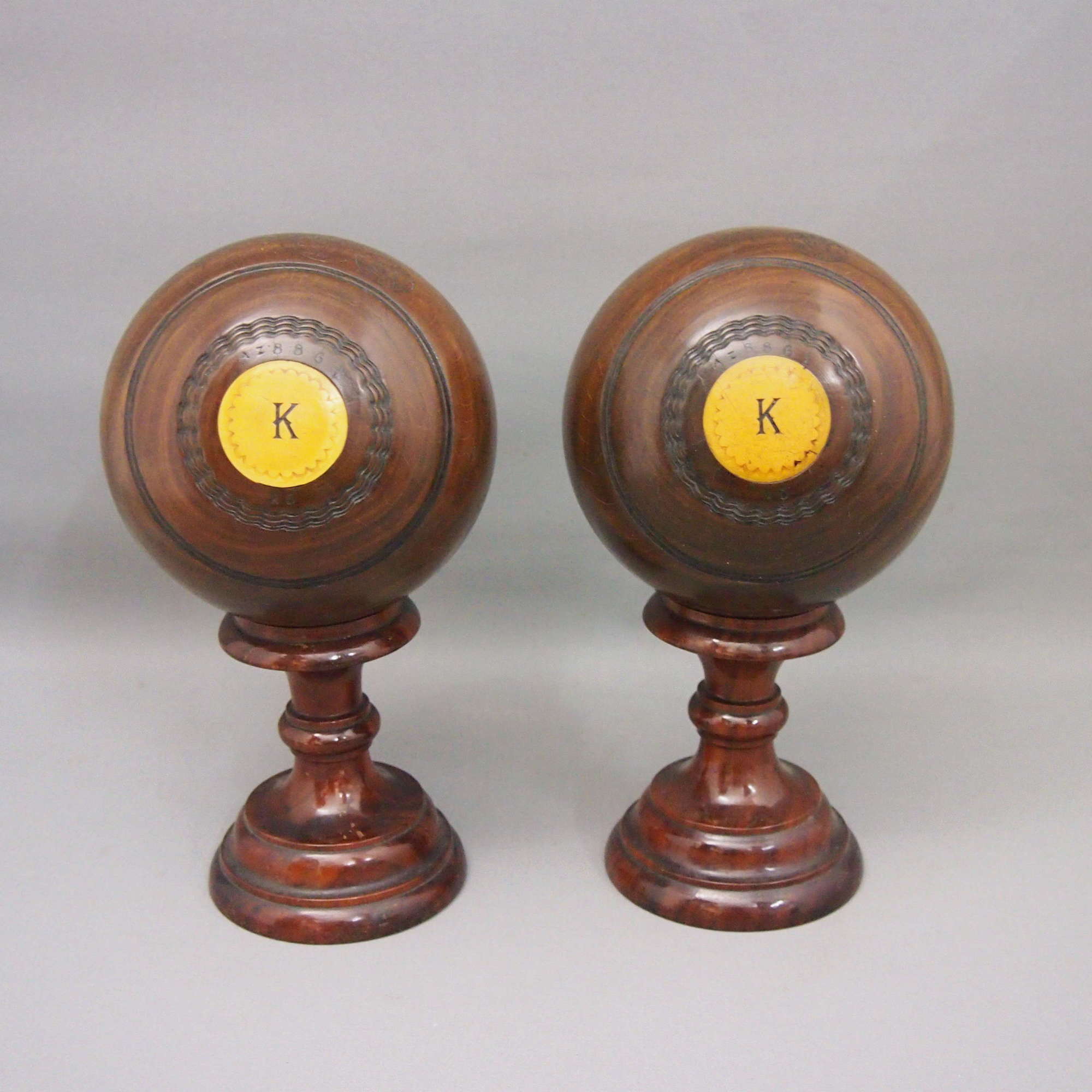 Pair of Antique Wood Bowling Balls on Turned Stands. W8656