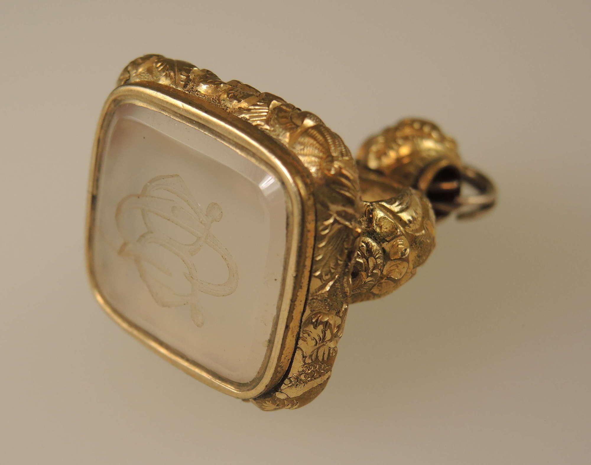 Large Victorian gilt cased seal set with a white stone c1850