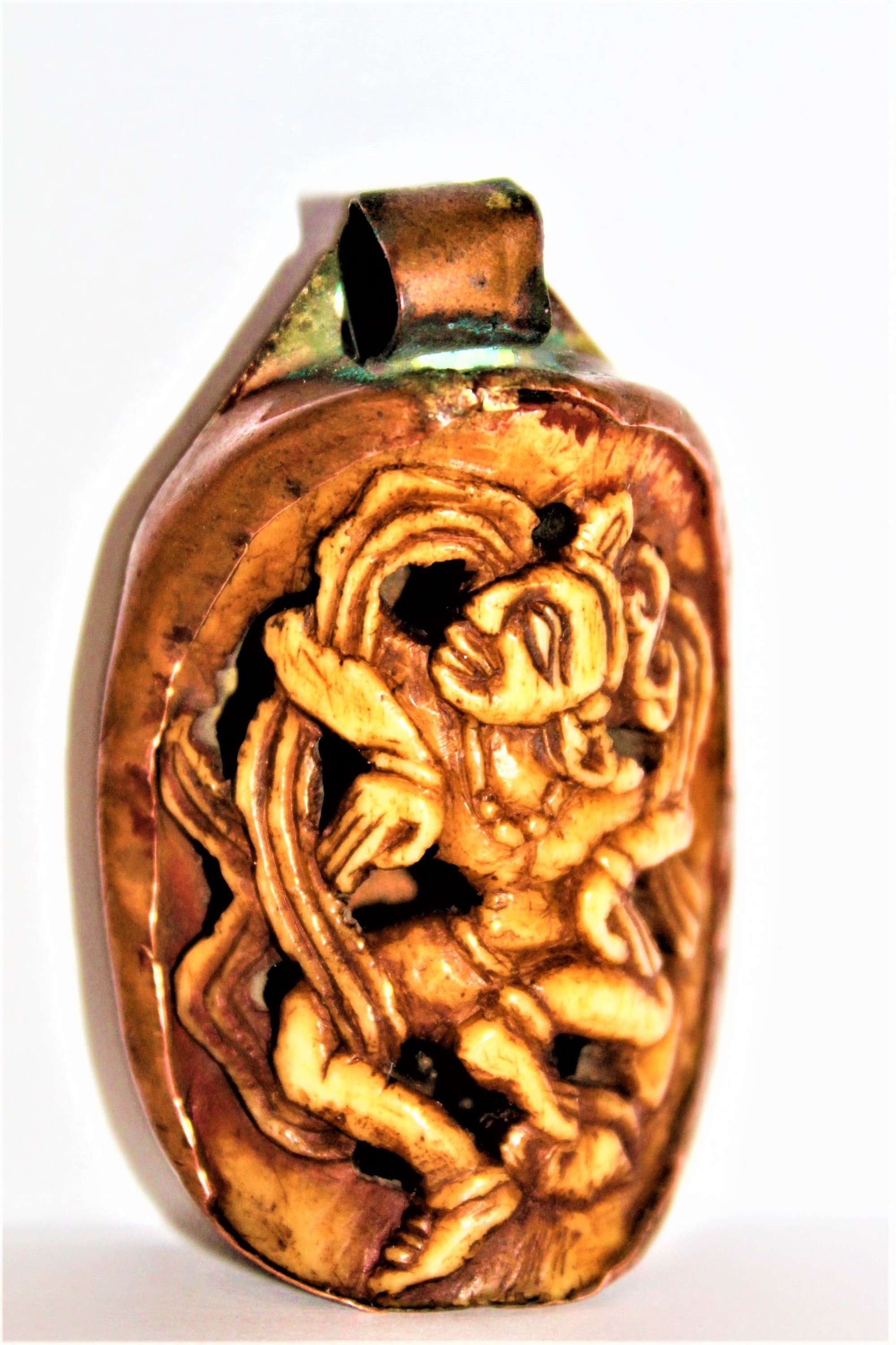 A Tibetan Antique Carved Bone Pendant Of A Dancing Goddess