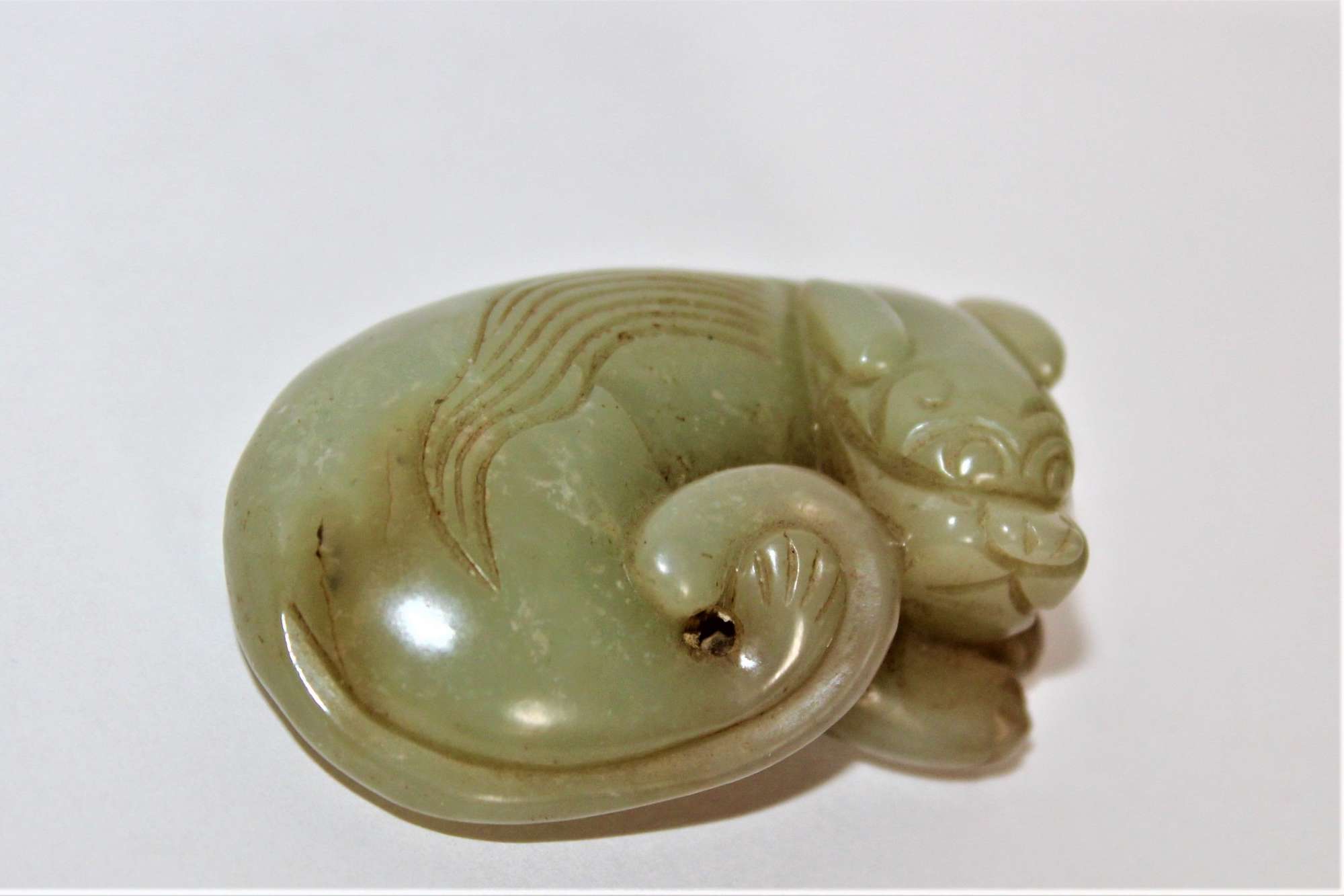 A Finely Carved Chinese Celadon Jade Cat Circa 1900