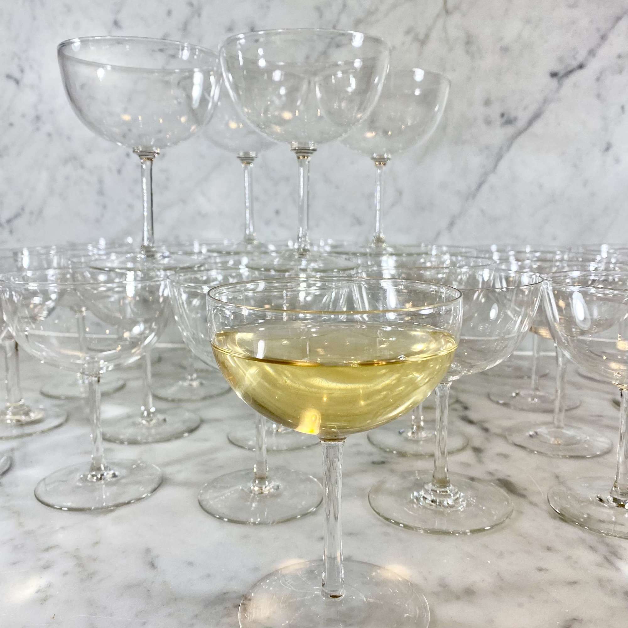 Rare set of 29 Edwardian champagne or cocktail coupes
