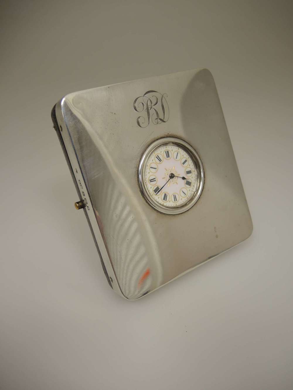 English silver watch stand with a fancy dial fob watch c1905