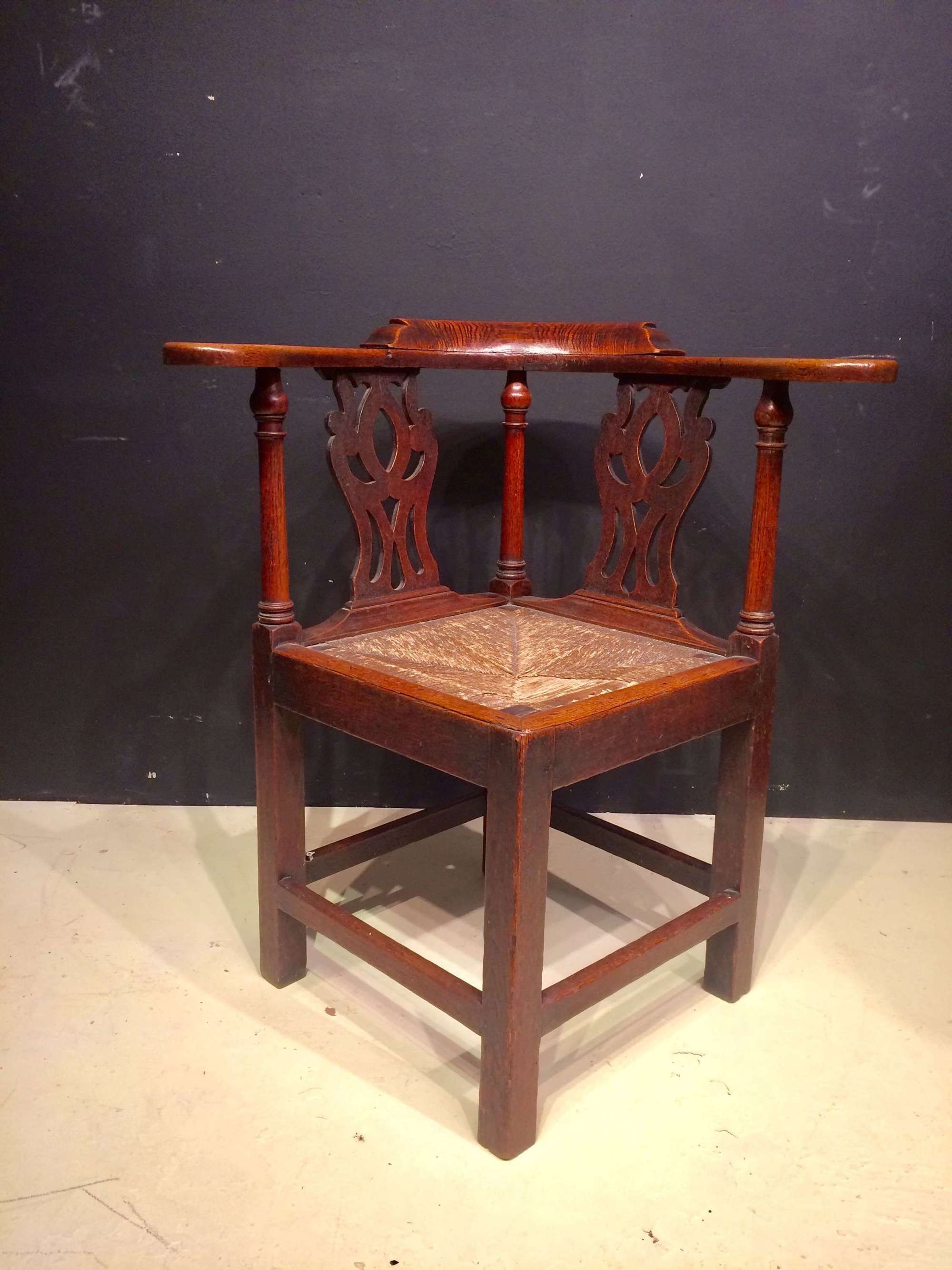 Georgian oak corner chair.