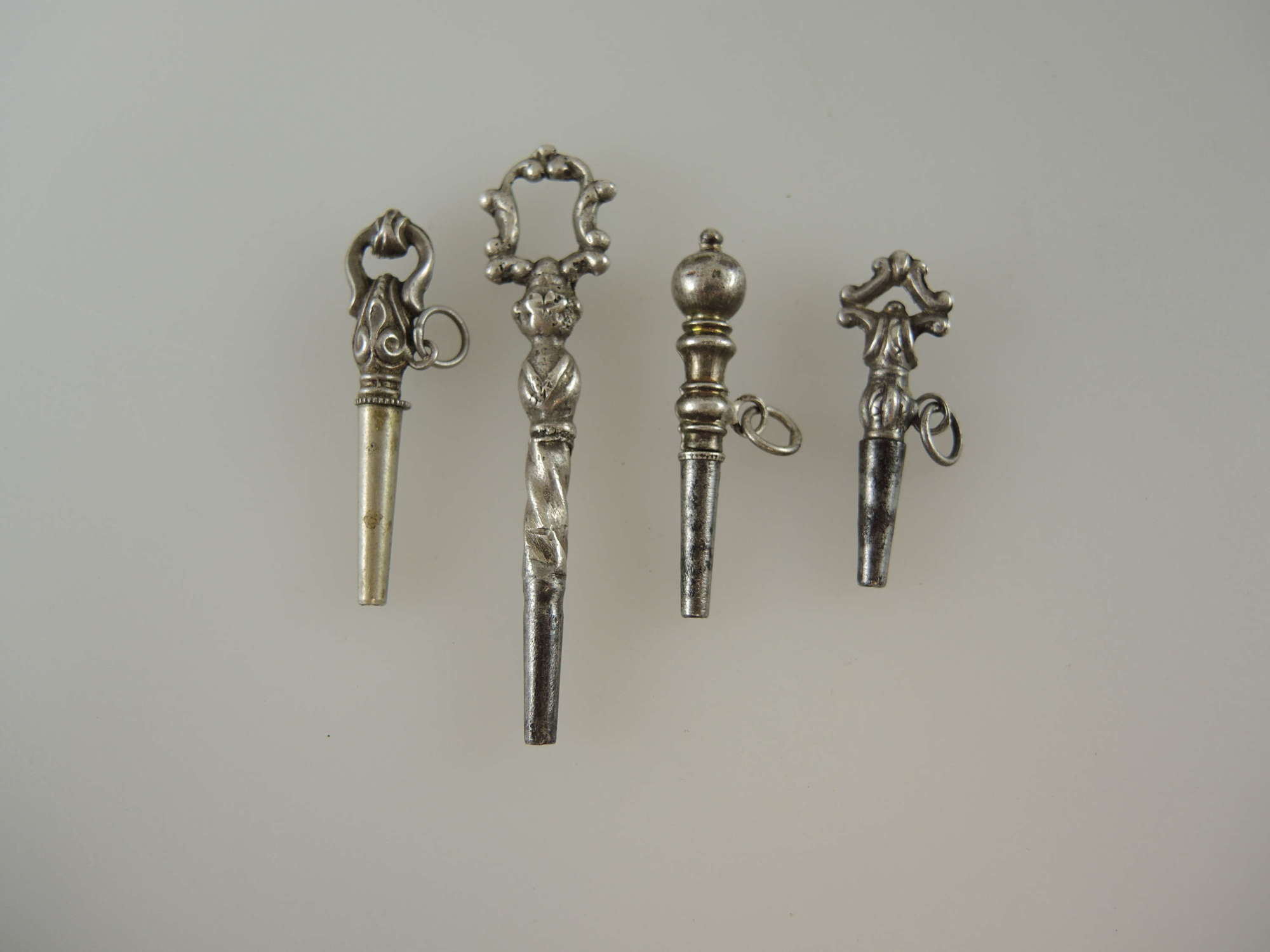 Group of 4 silver pocket watch keys c1800 – 1825