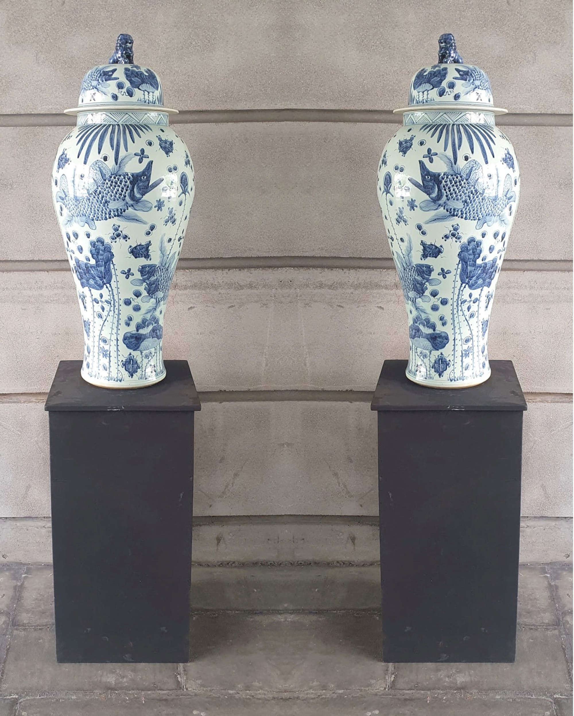 Pair Of 20th Century Urns On Stands
