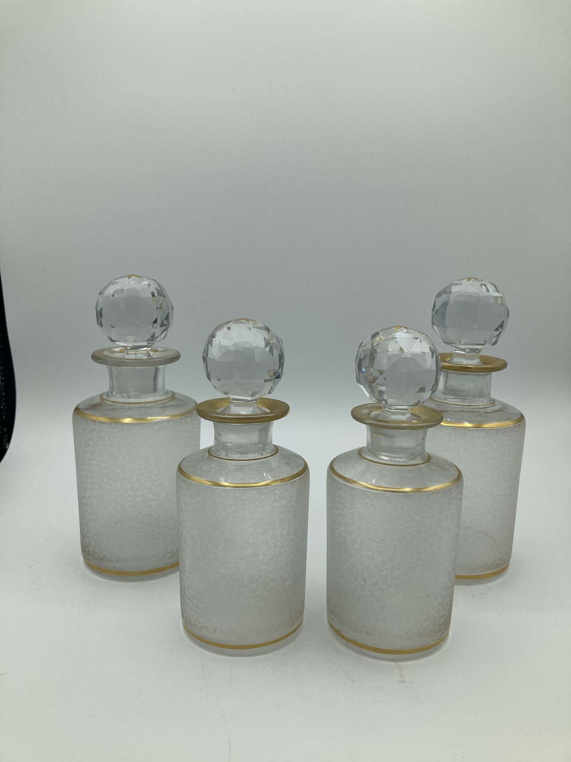 A Set Of 4 French Perfume Bottles