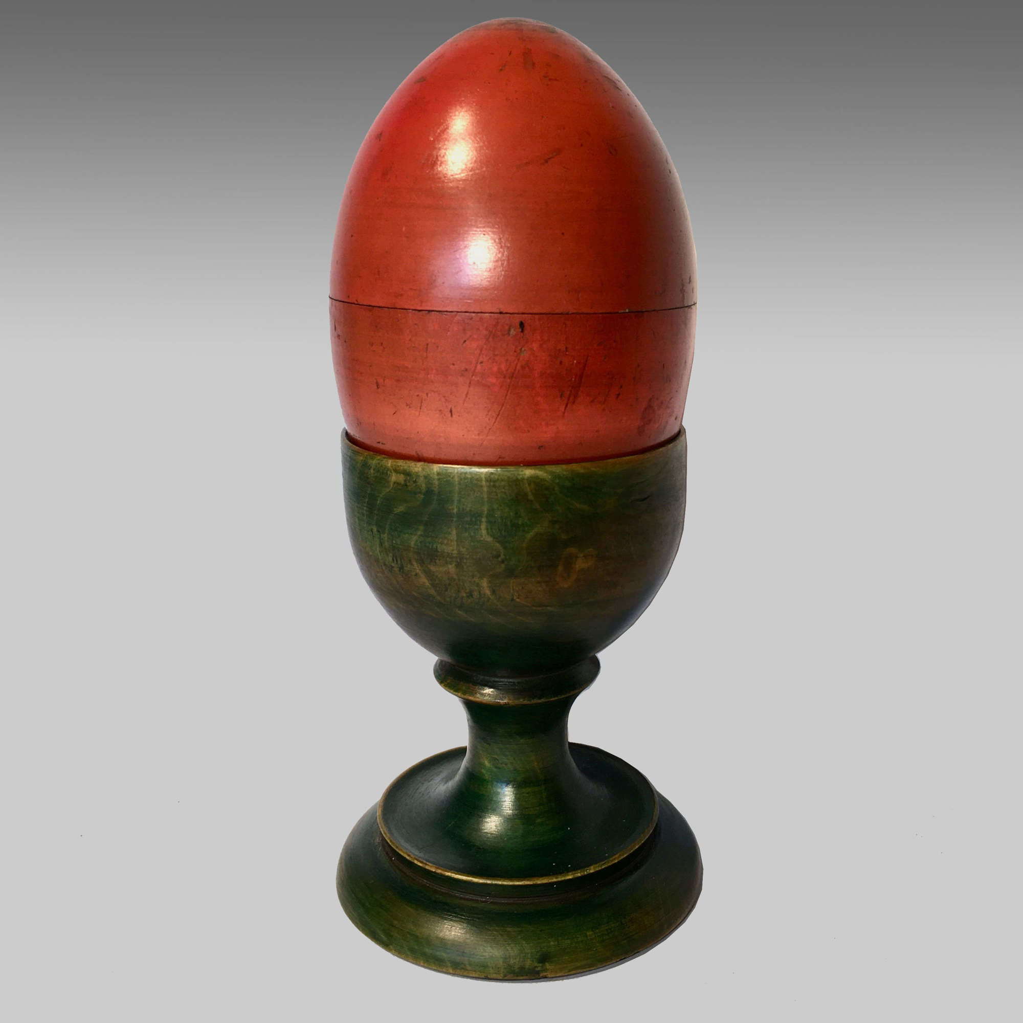 19th century painted treen nesting eggs and eggcup