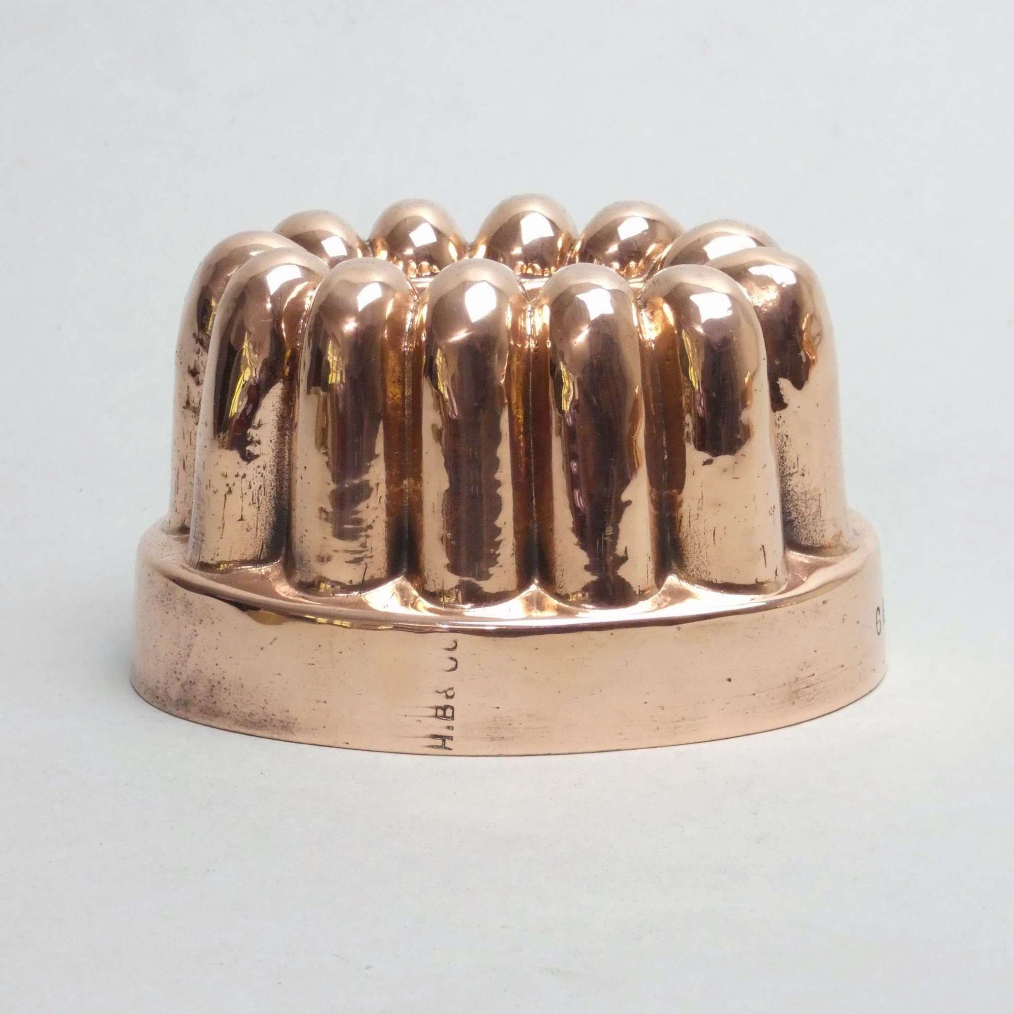 Small, fluted copper jelly mould