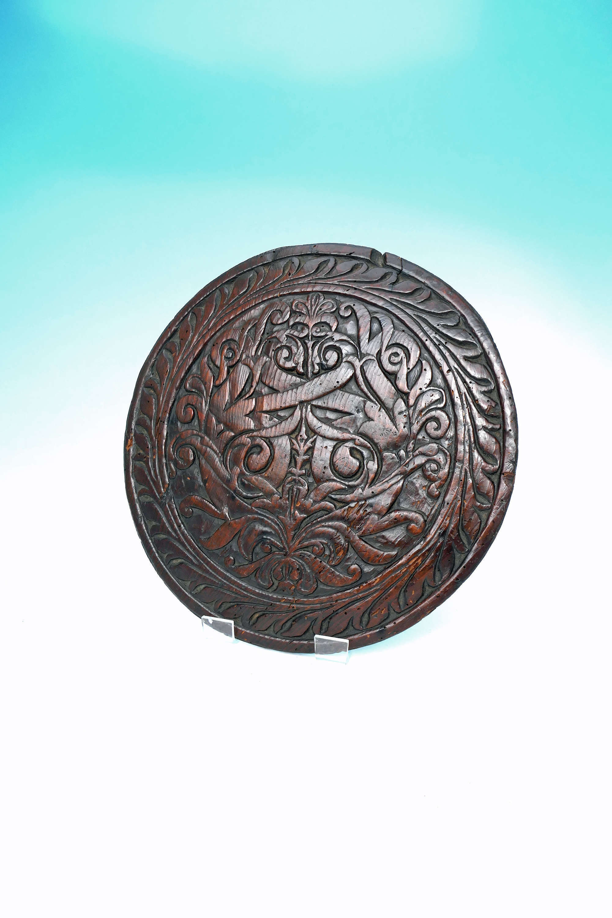 Antique Carved 17thc Pine Roundel Decorated With A Floral Pattern.