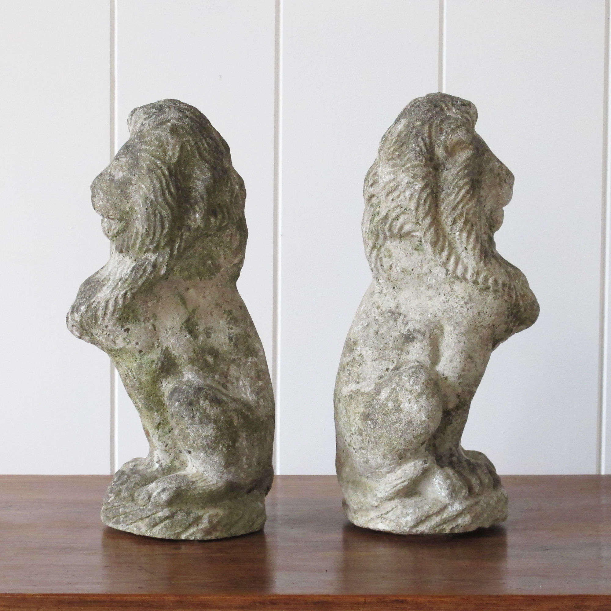 Charming Small Weathered Lions.