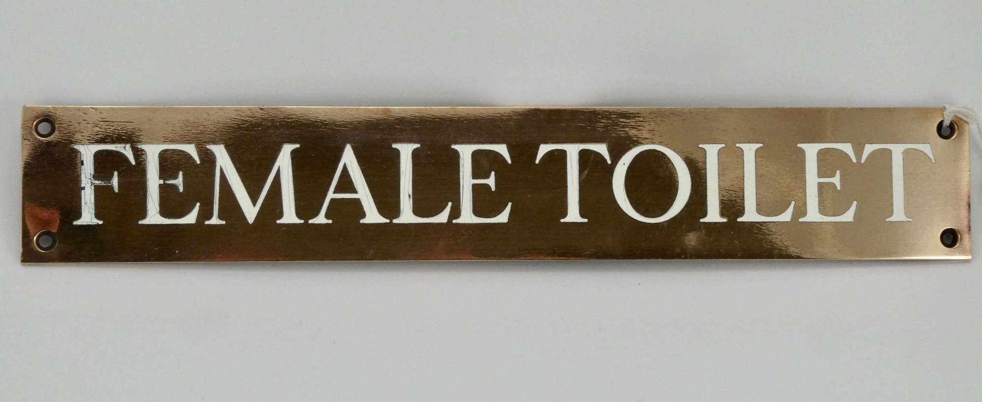 Solid Bronze and Enamel 'Female Toilet' sign, circa 1920