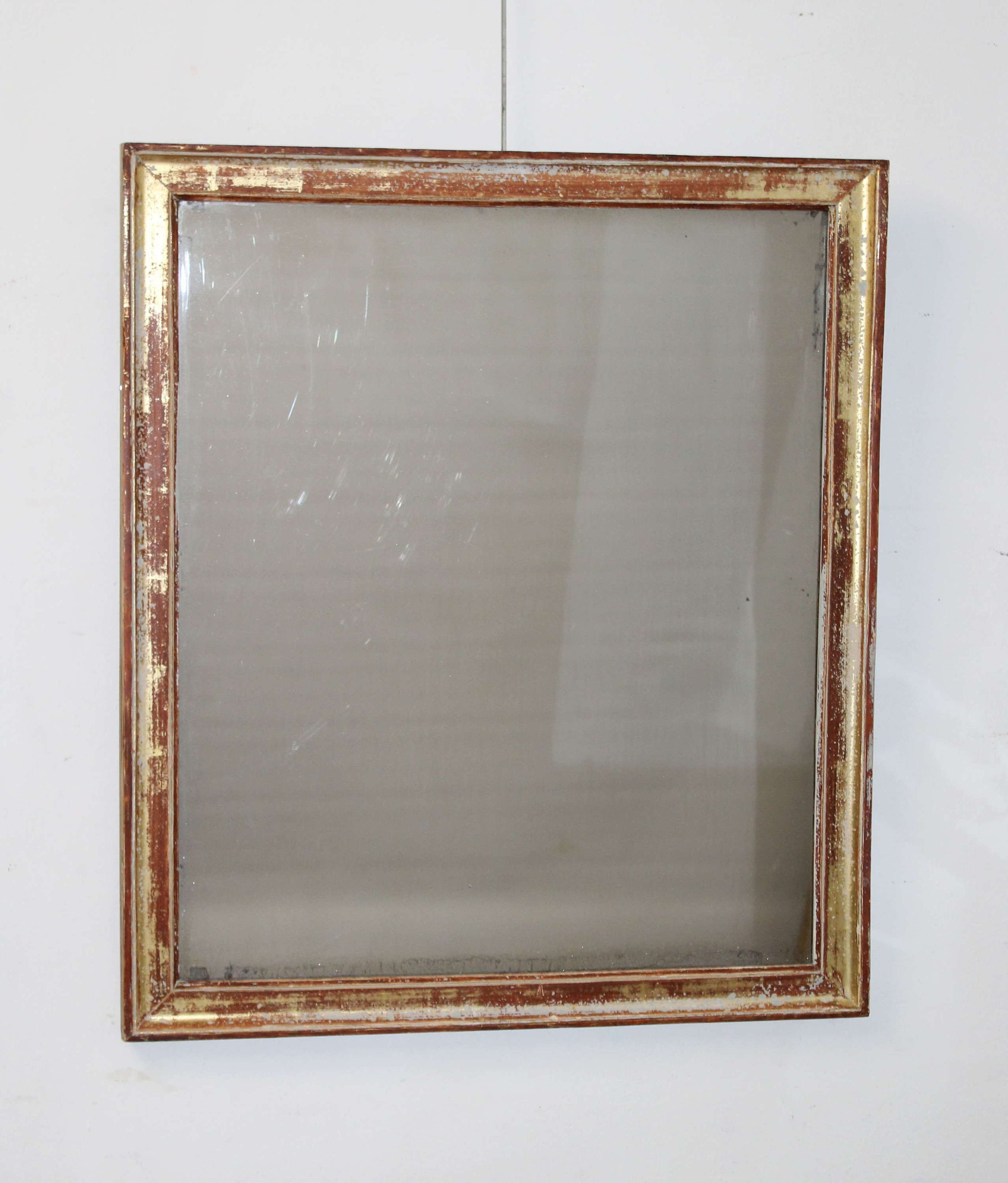 Antique mirror with gold, terracotta and cream frame