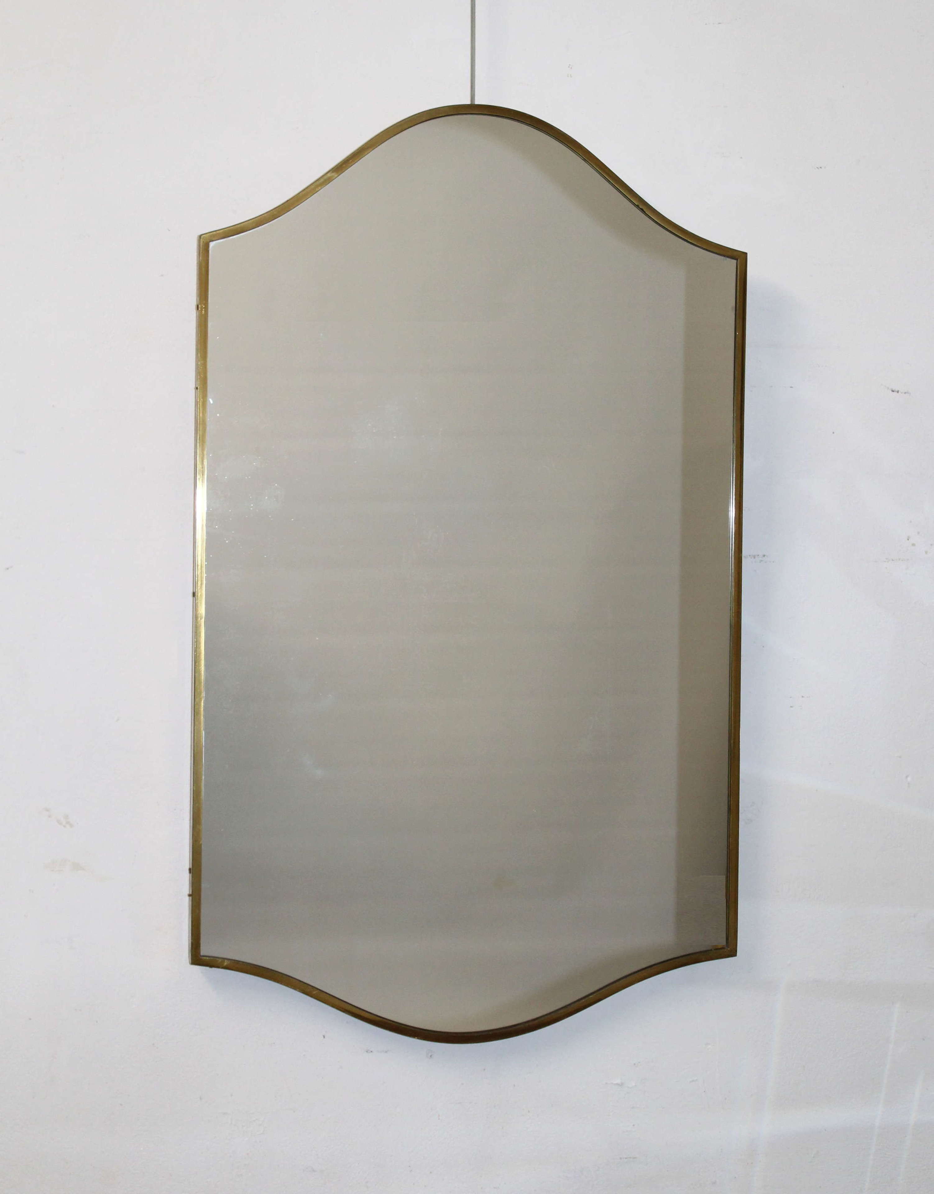 Mid century modern Italian mirror with curved top and base