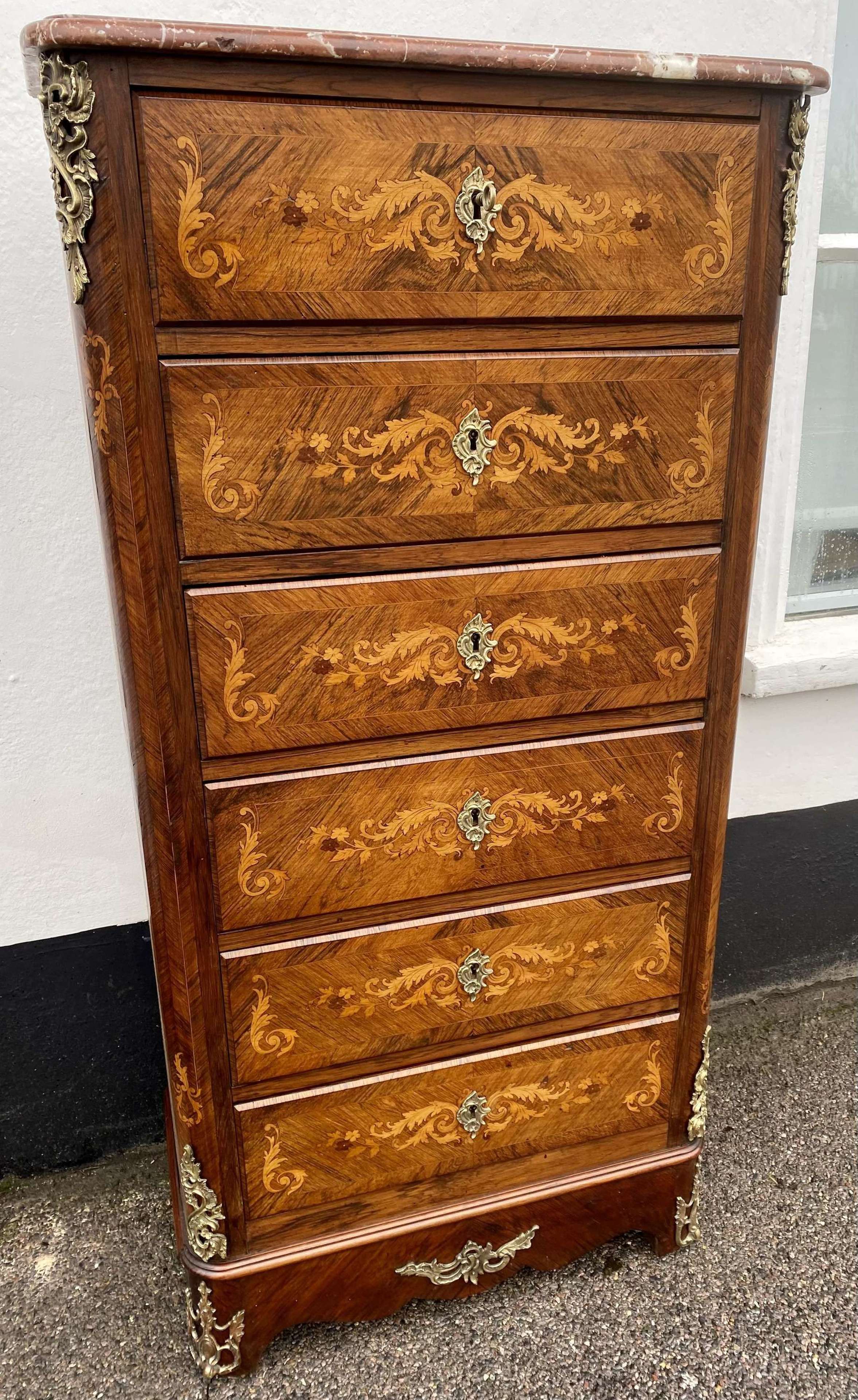 A French marquetry six drawer chest