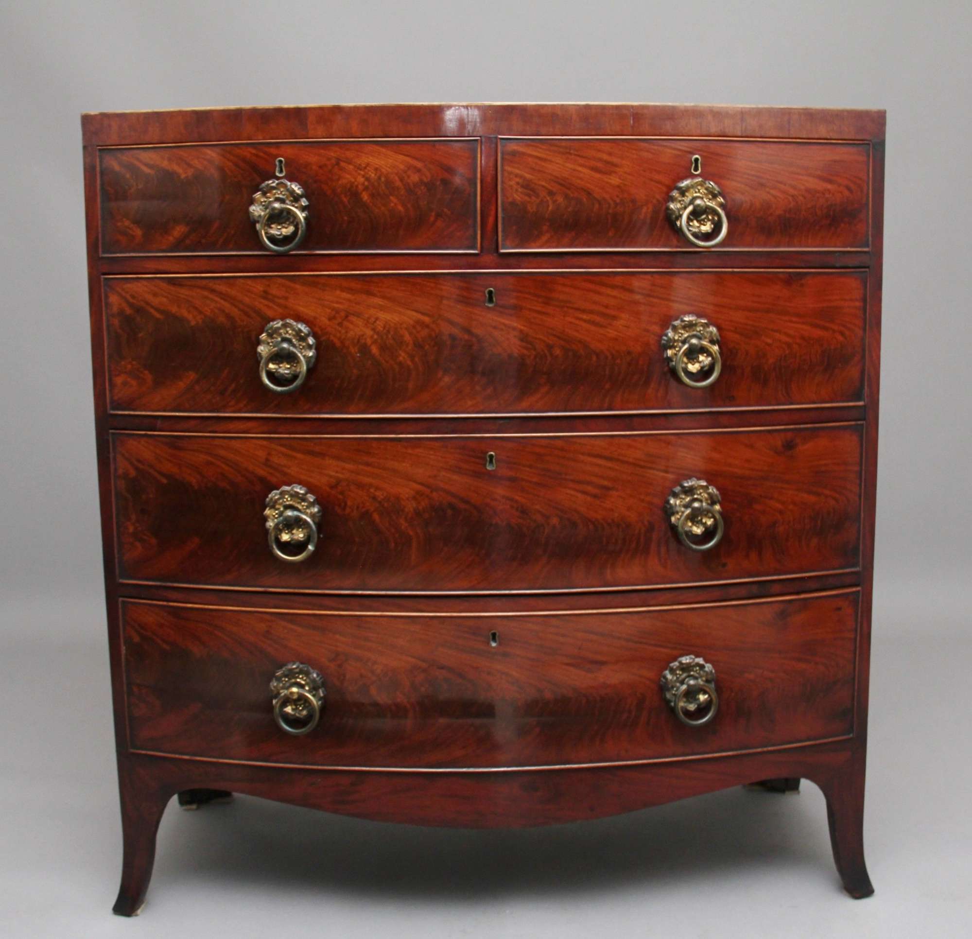 19th Century Flame Mahogany Bowfront Antique Chest Of Drawers