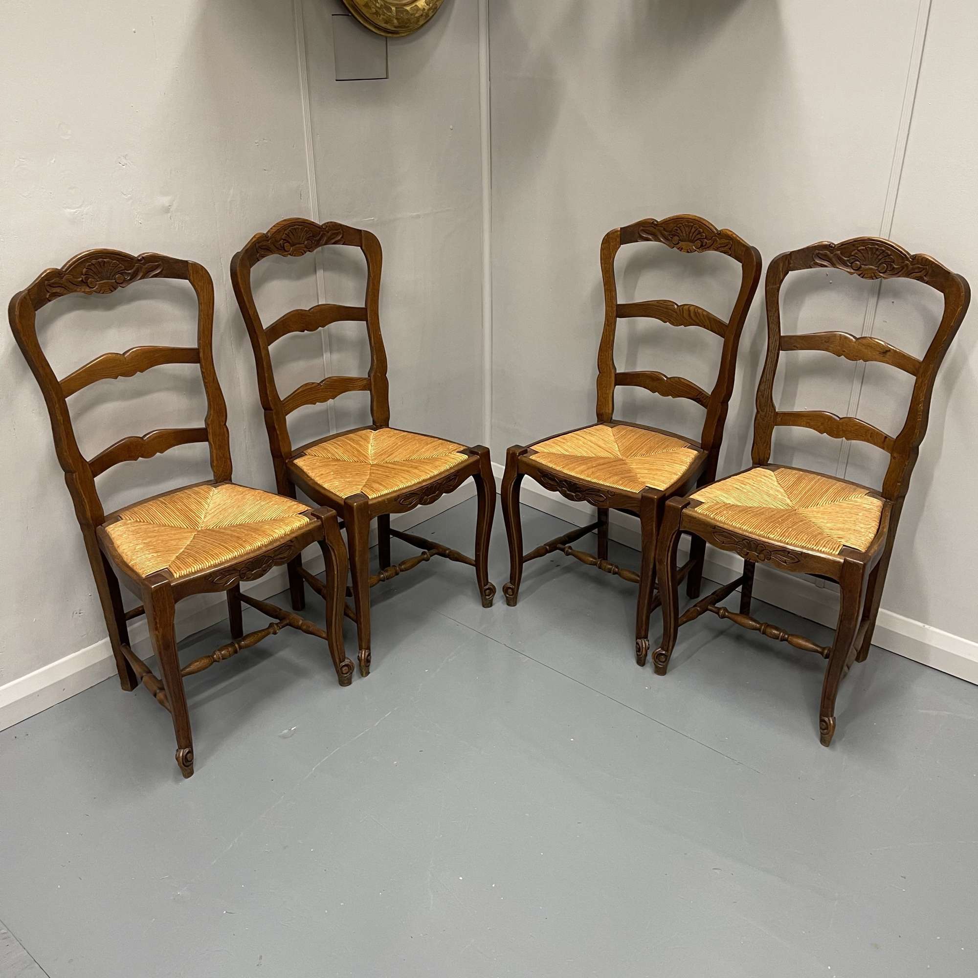 Set Of Four French Oak And Rush Seat Dining Chairs