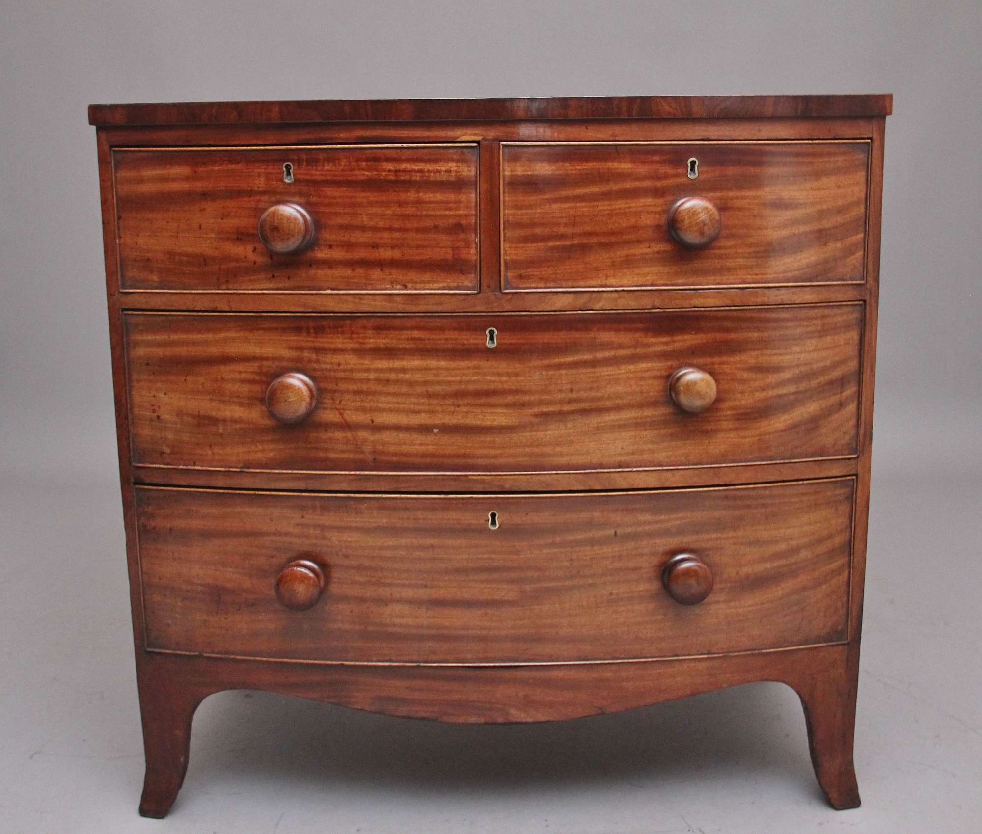 Early 19th Century Mahogany Bowfront Antique Chest Of Drawers